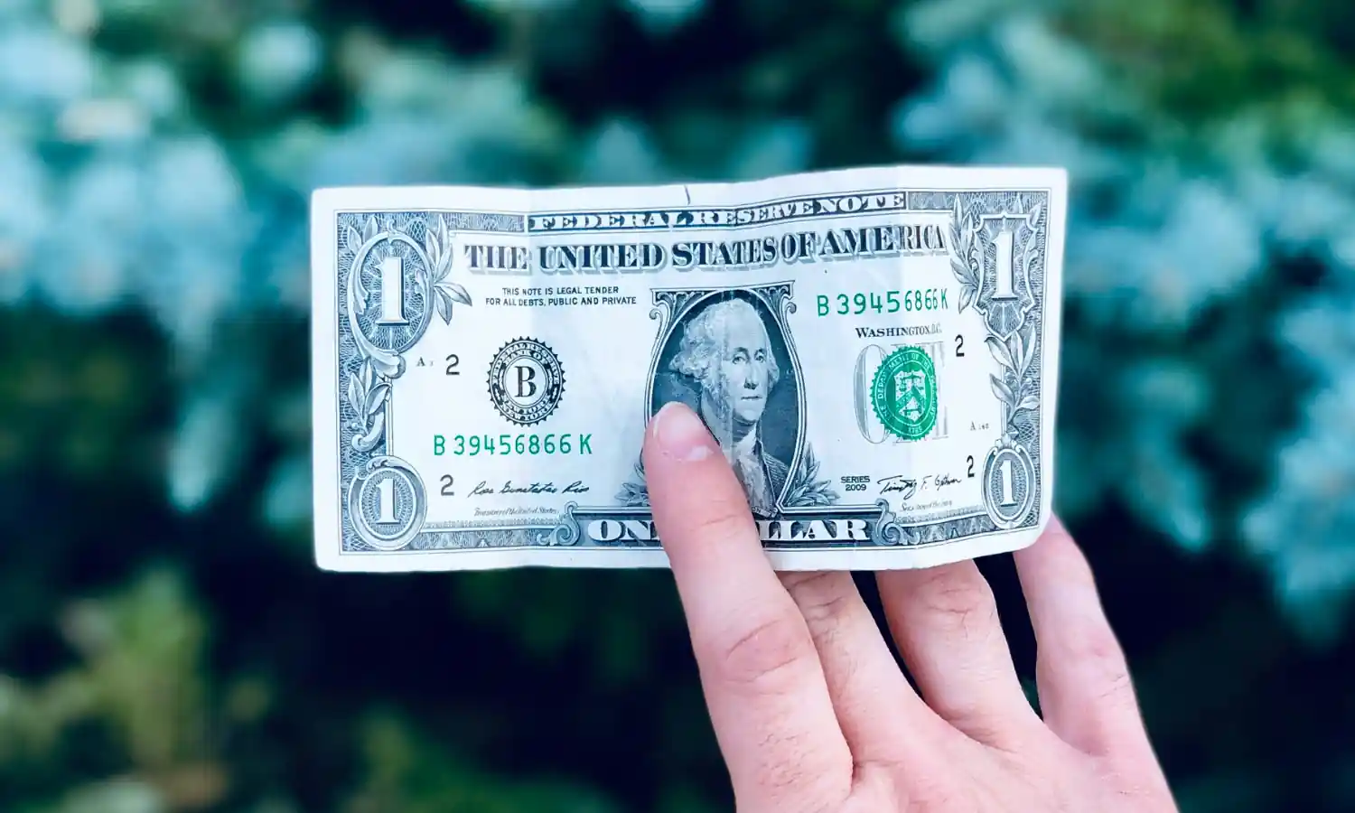 Dollar being handed over